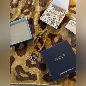 Anoup bracelet with sapphire like stone and M initial New in box